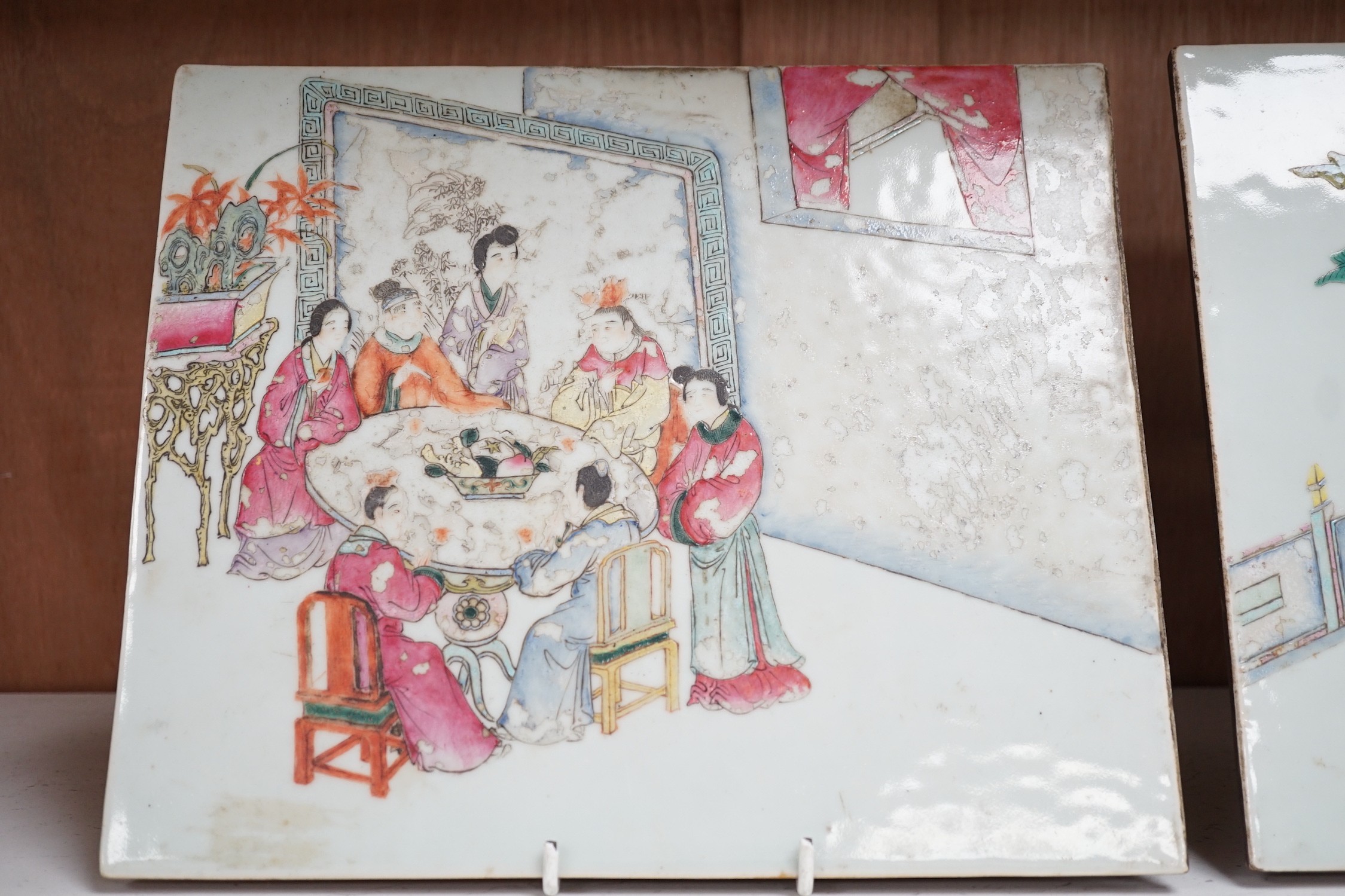 A pair of Chinese Republic period porcelain famille rose plaques, 29cms wide x 25cms high